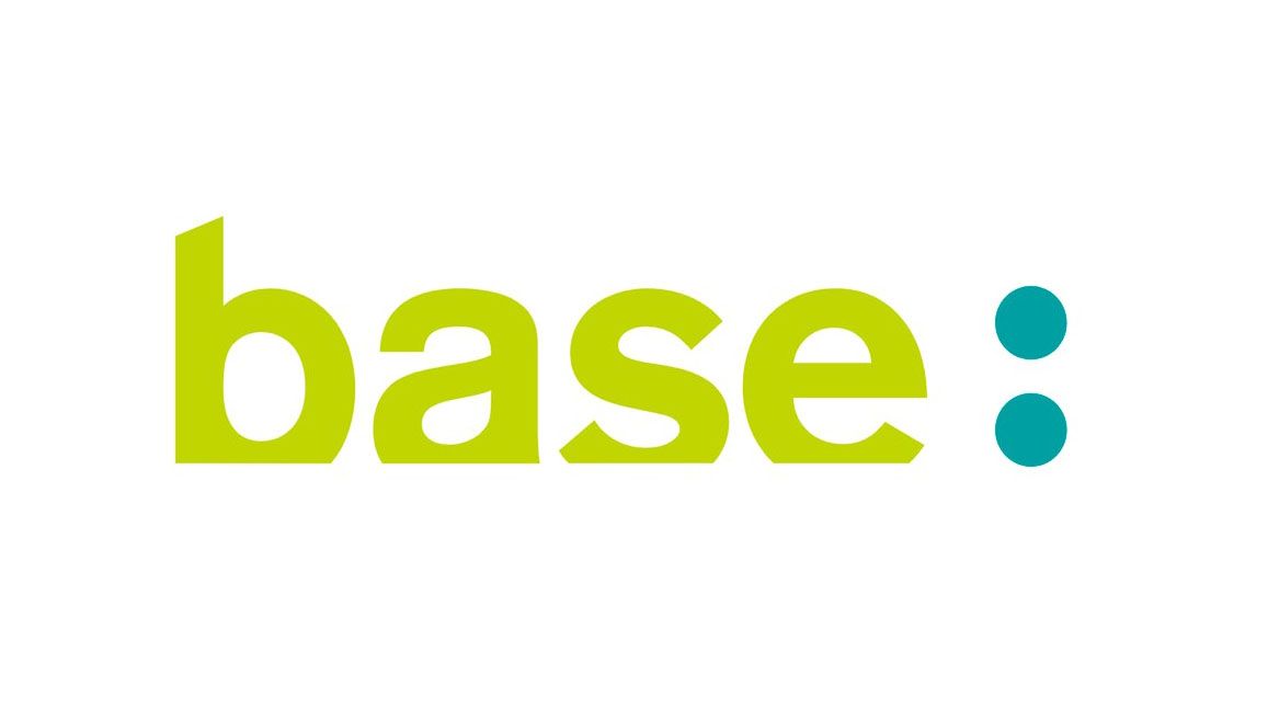 La imagen muestra la palabra "base" en minúsculas, de color verde claro, seguida de dos puntos de color verde azulado sobre fondo blanco.